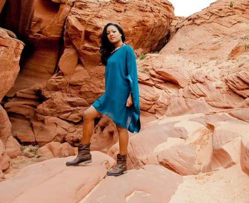 RN standing on a rock in Arizona after long day on the job